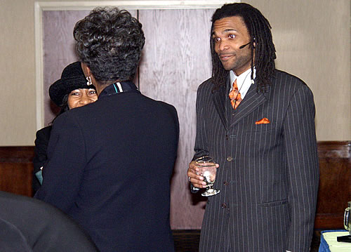 Erroll mingling with Sisters before the seminar begins, Detroit, Michigan Black Business Seminar