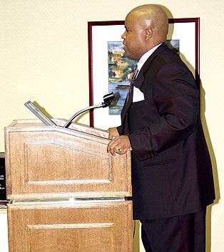 Delxino speaking to the audience, Los Angeles, California Black Business Seminar