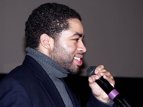 Issa speaking on stage, New York City Black Business Seminar