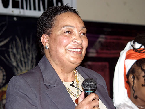 Jacqueline speaking on stage, New York City Black Business Seminar