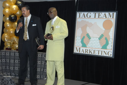 Gilbert and Oliver accepting the 2006 Black Manufacturer of the Year Award, 2007 TAG Awards Show